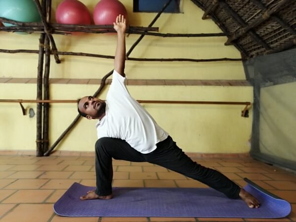 Warrior yoga pause from sumesh, Yoga instructor in Pondicherry