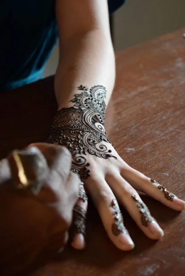 intricate patterns on mehendi, traditional natural henna tattoo at Sita cultural center